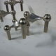 Lot of 4 chrome Nagel candlesticks