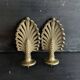 Pair of bronze curtain rod finials in the Napoléon III style with a palmette design.