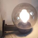 Delmas globe “smoked” wall lamp