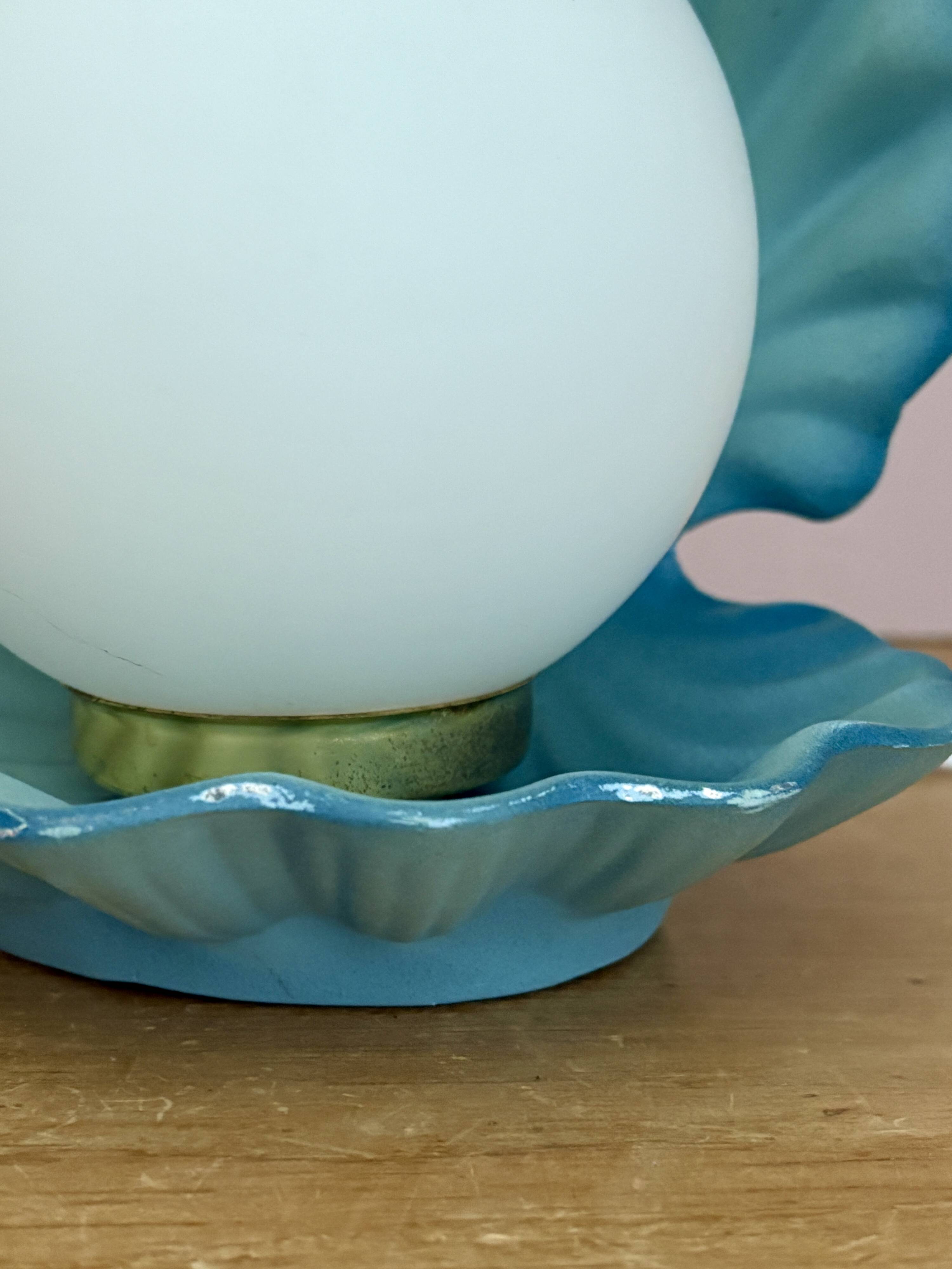 Vintage lamp in the shape of a shell in blue and opaline ceramic.