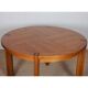 Round extendable dining table in wood published by Monopoly, 1970.