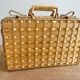 Vintage woven wicker suitcase