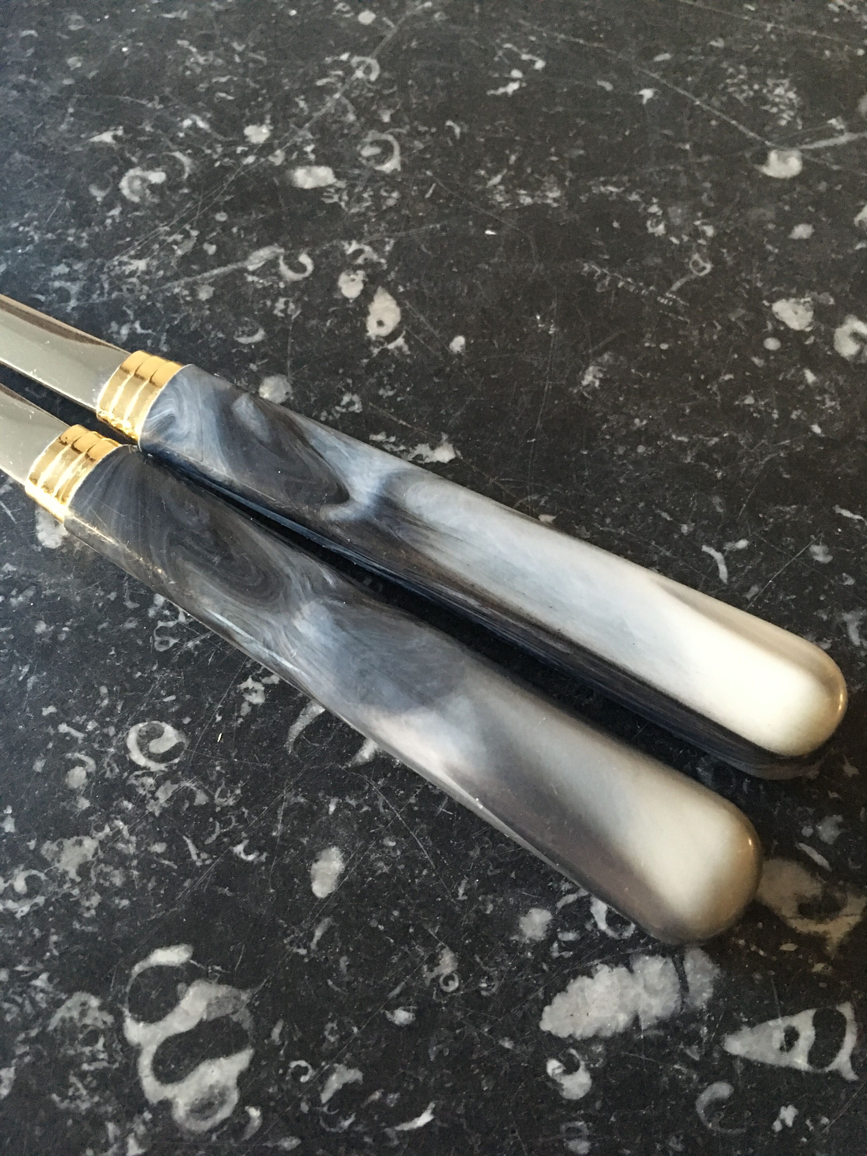 Guy Degrenne salad cutlery in stainless steel and bakelite