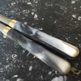 Guy Degrenne salad cutlery in stainless steel and bakelite