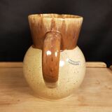 The Pitcher and its two stoneware cups