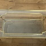 Rare bronze, brass, and steel mesh coffee table with a double glass top resting on a brass mesh. French work by Jansen