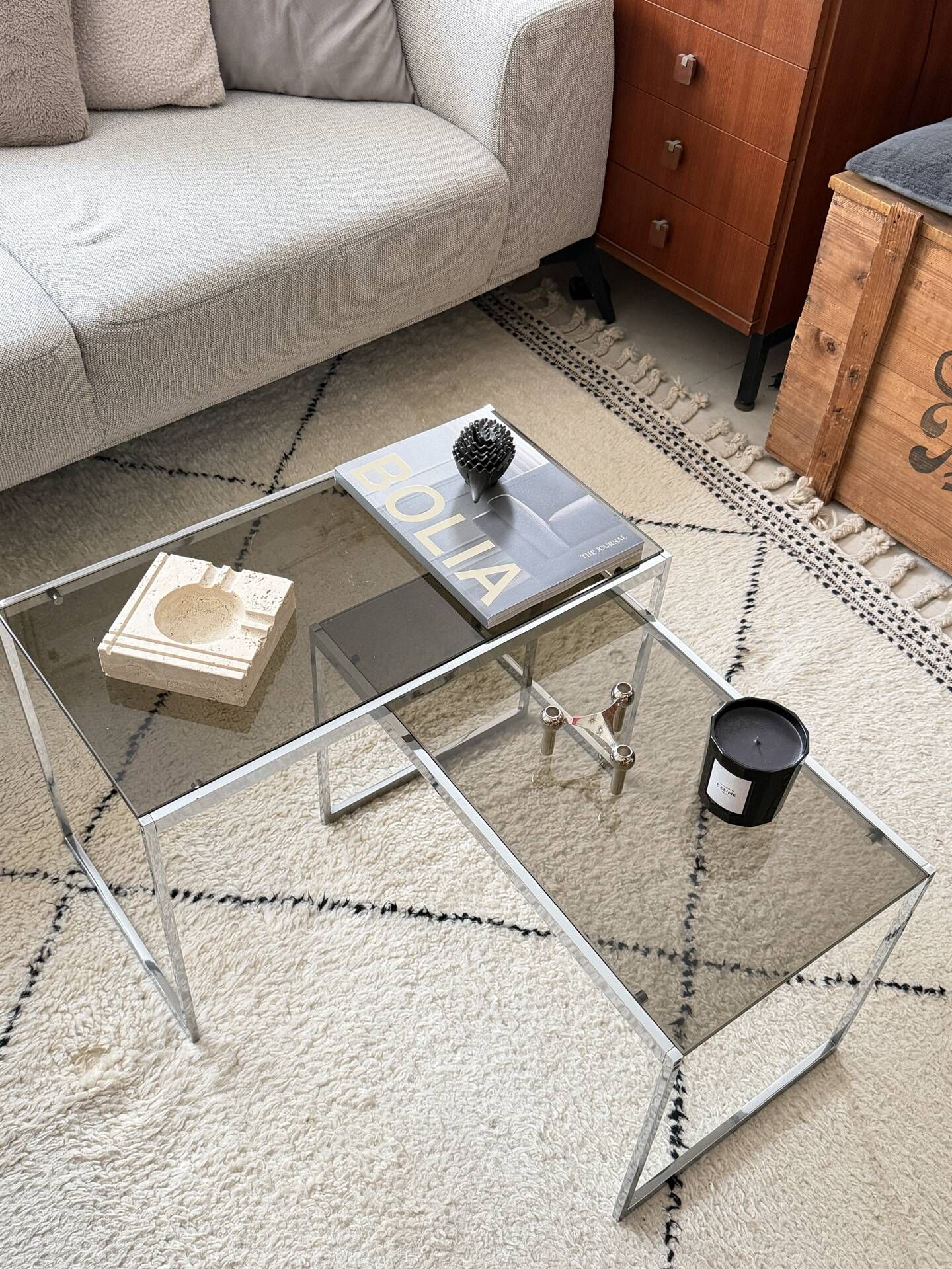 Set of 2 vintage nesting coffee tables in chrome metal and smoked glass.