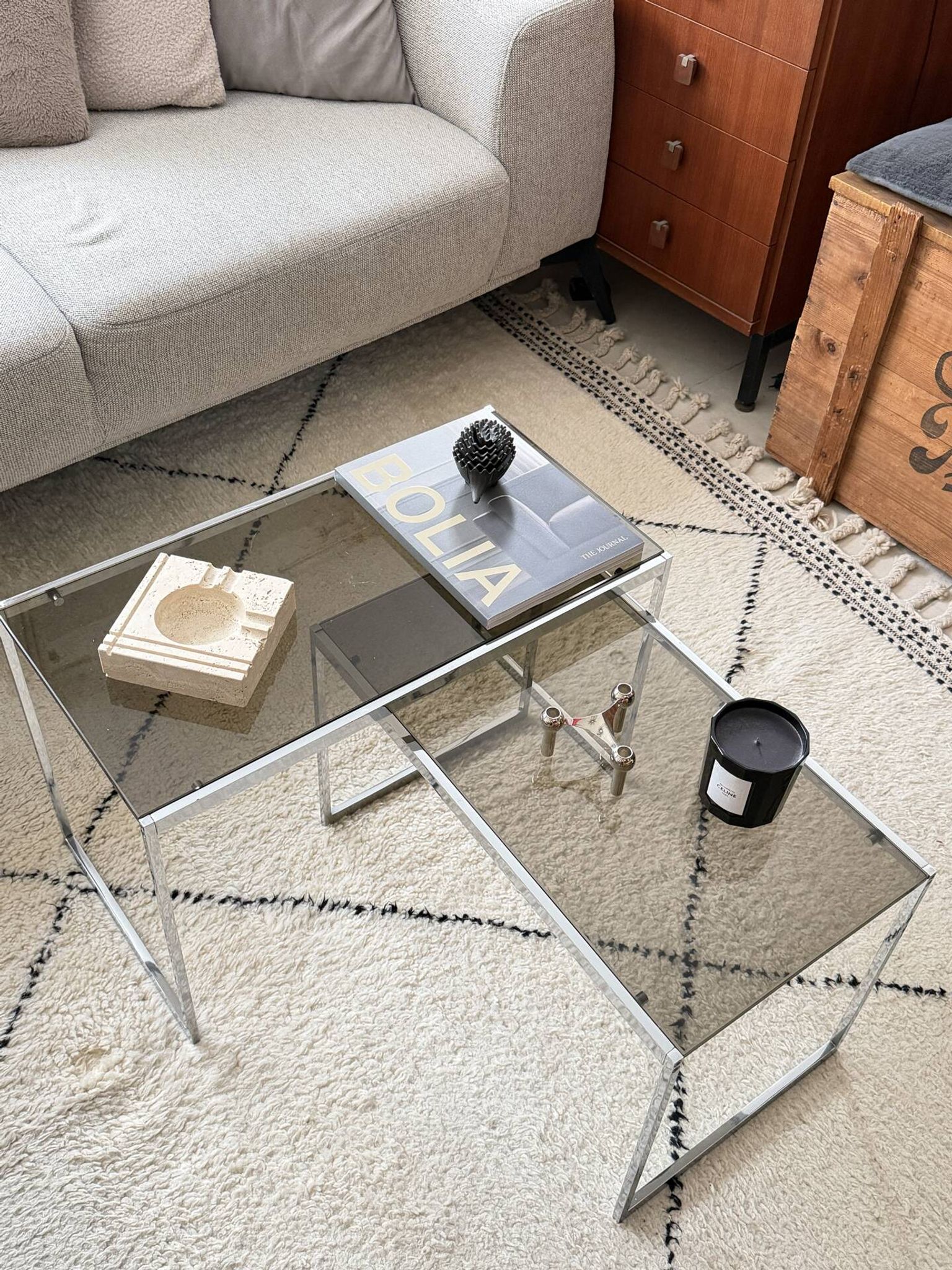 Set of 2 vintage nesting coffee tables in chrome metal and smoked glass.