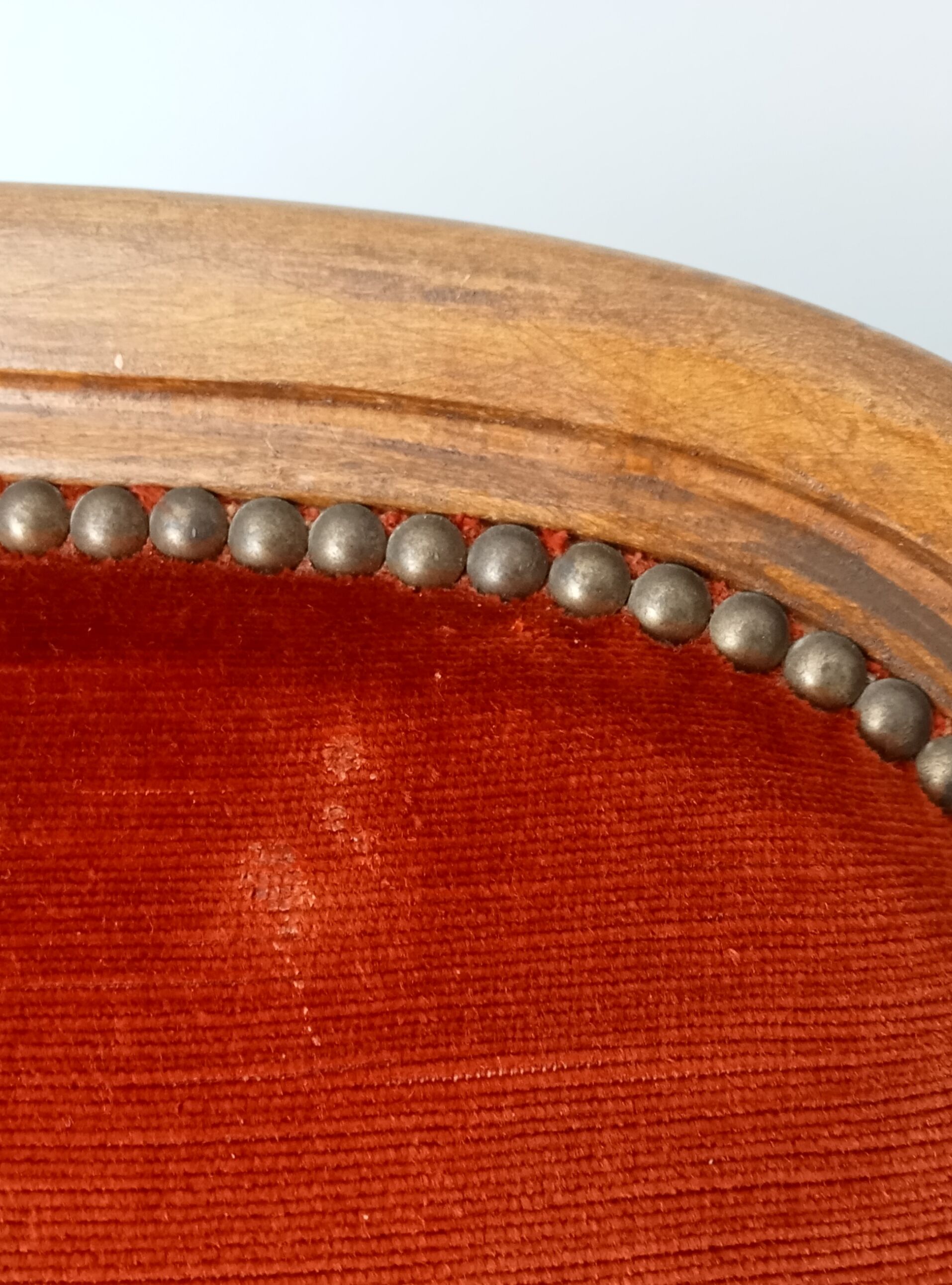 Walnut and velvet voltaire armchair