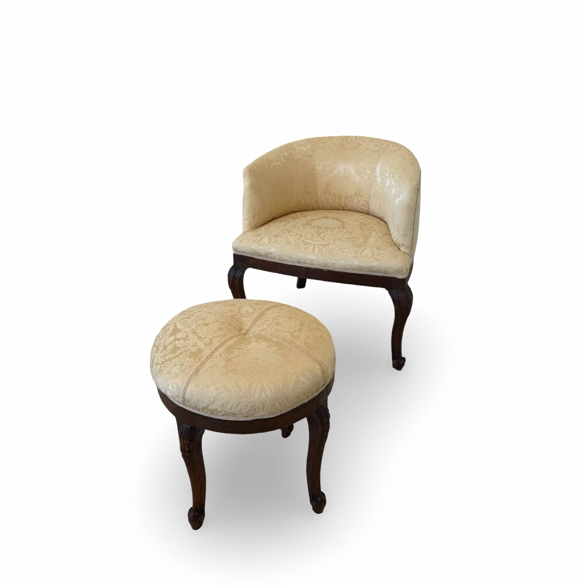 An antique Italian bar chair and a matching tufted vanity stool.