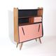 Vintage retro wooden storage furniture with salmon-coral accents and tapered legs, 1950s.