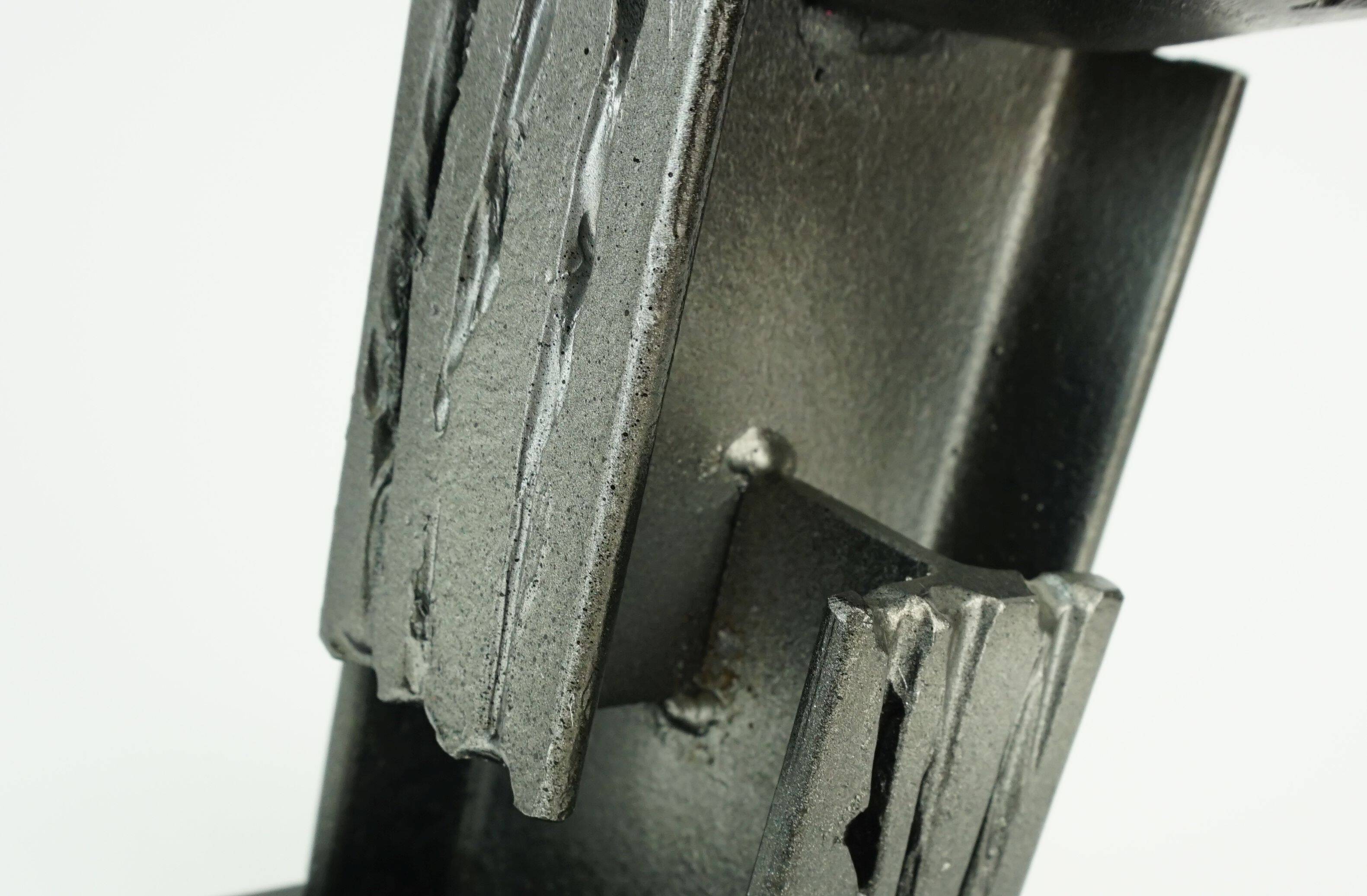Mid century modern brutalist design iron candle holder