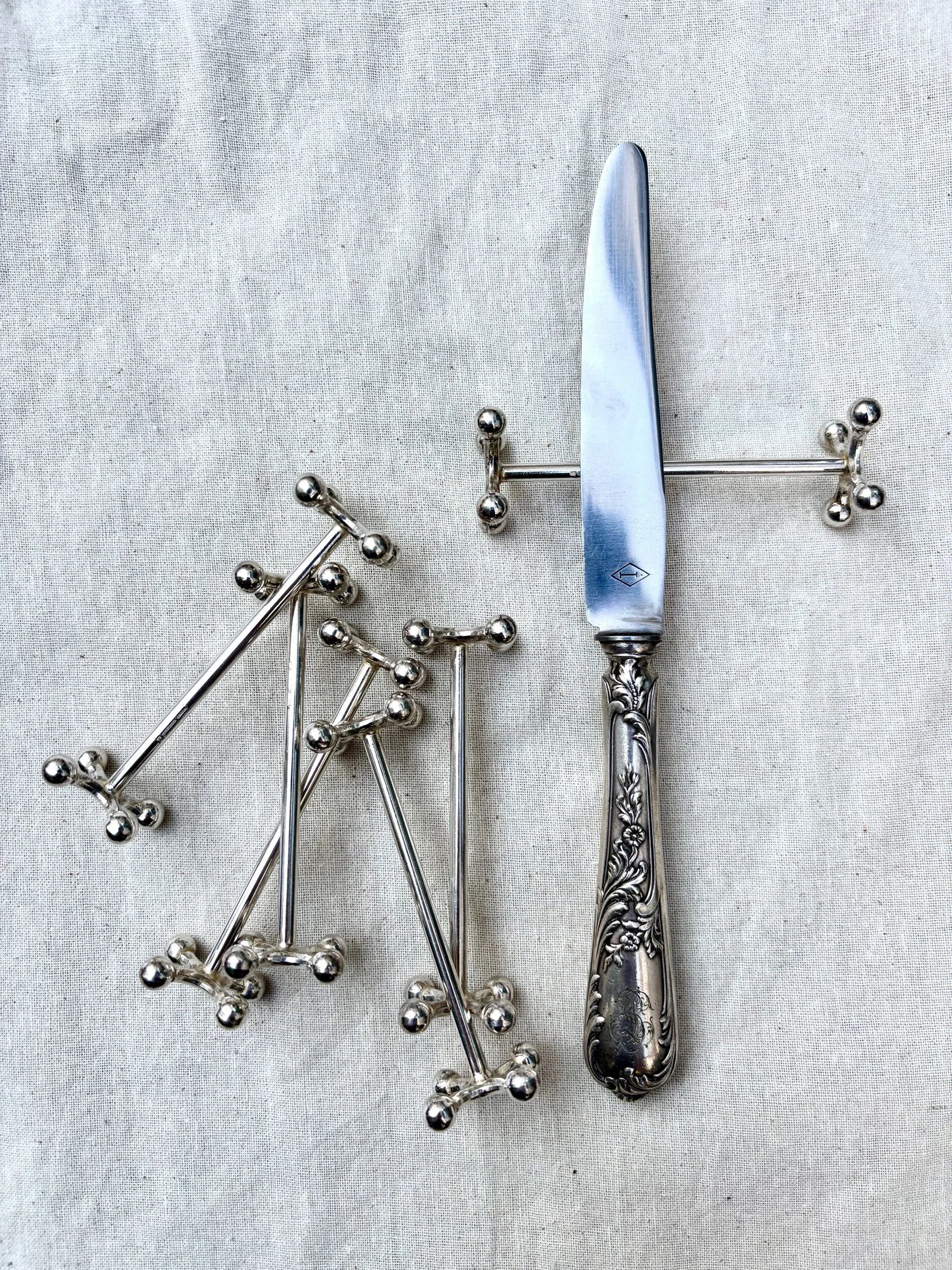 6 Christofle silver-plated knife rests