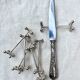 6 Christofle silver-plated knife rests