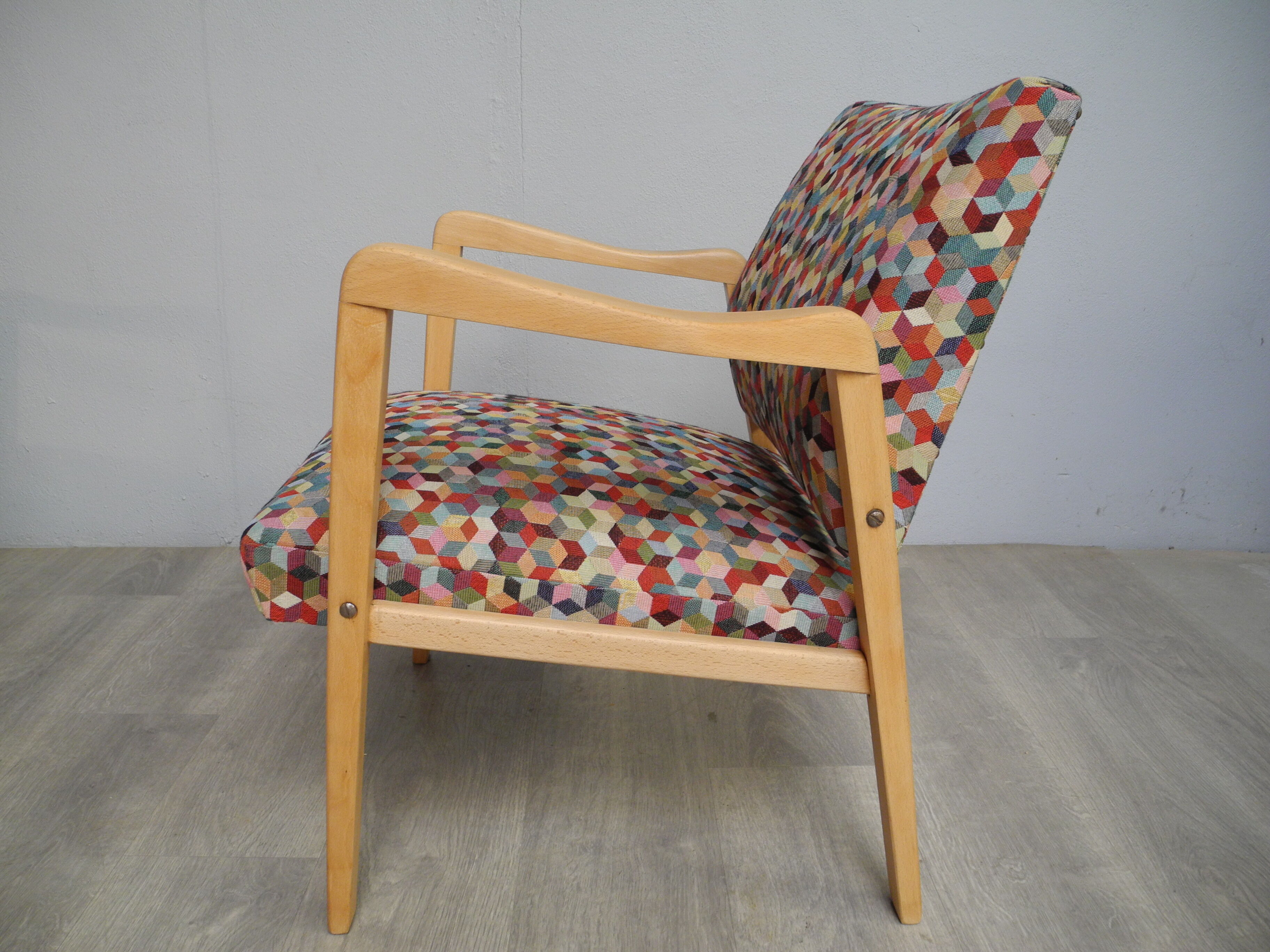 Vintage wood armchairs and fabrics 70s