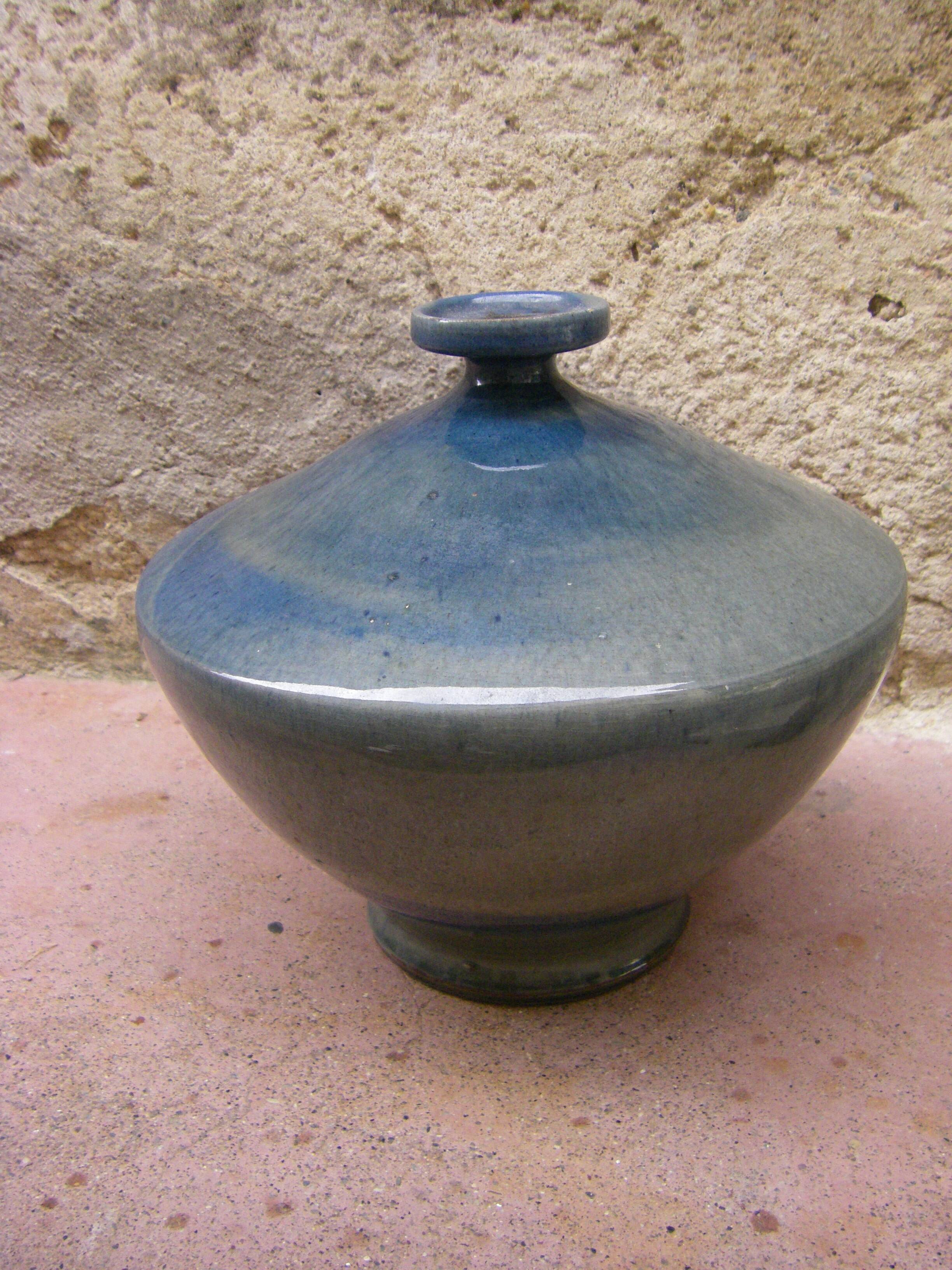 Vintage spinning top vase