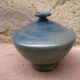 Vintage spinning top vase