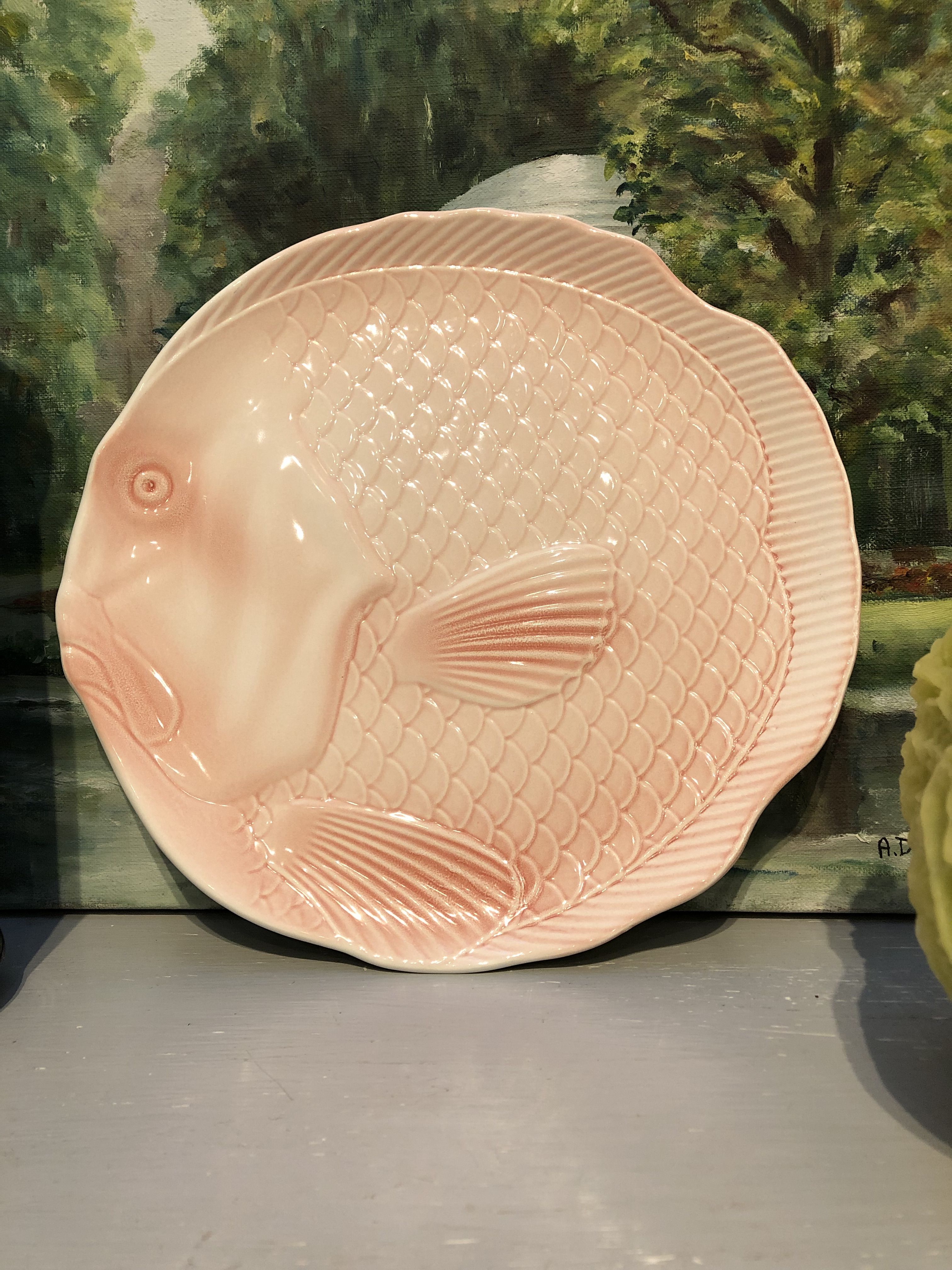 Old flat plate in the shape of saline pink fish baths made in France
