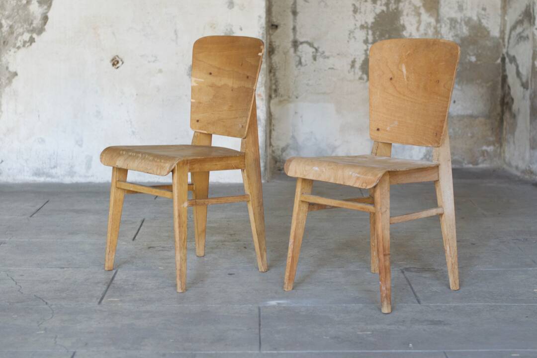two  style wooden chairs