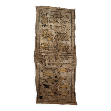 Decorative panel with drawings on bark
