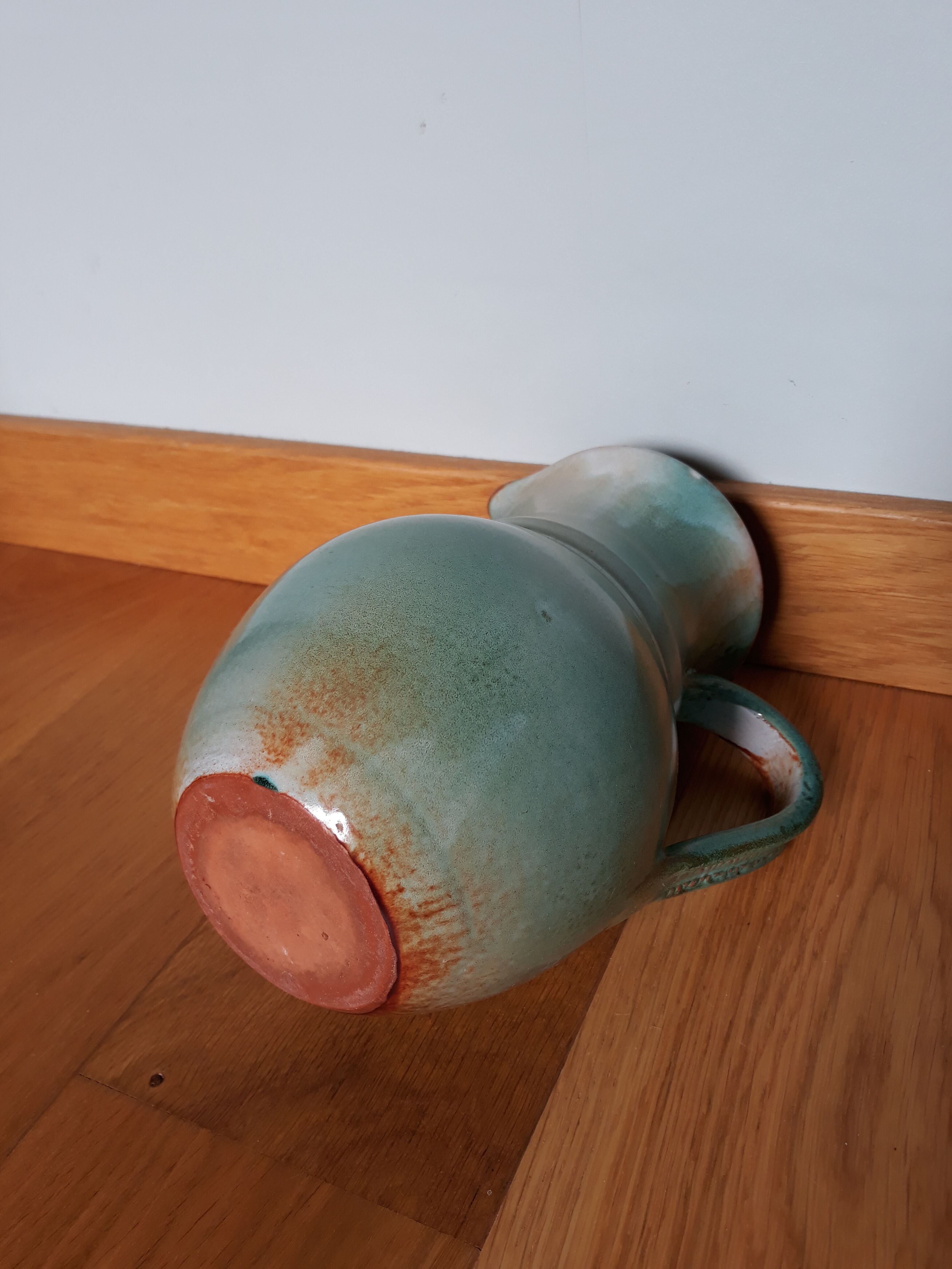 Pitcher with handle green celadon turquoise and caramel
