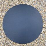 Adjustable round table in steel and glass