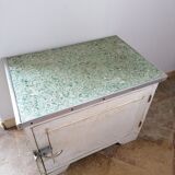 Piece of furniture made of wood and zinc