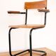 Desk with bauhaus style tubular steel chair