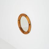 Sculptural wall mirror in solid pine