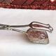 Wrought silver plated cake clips