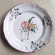 Hand-painted earthenware plate from eastern France, 18th century.