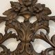 Grand miroir ou trumeau à parcloses en bois sculpté et doré. Travail italien du début du XIXe siècle