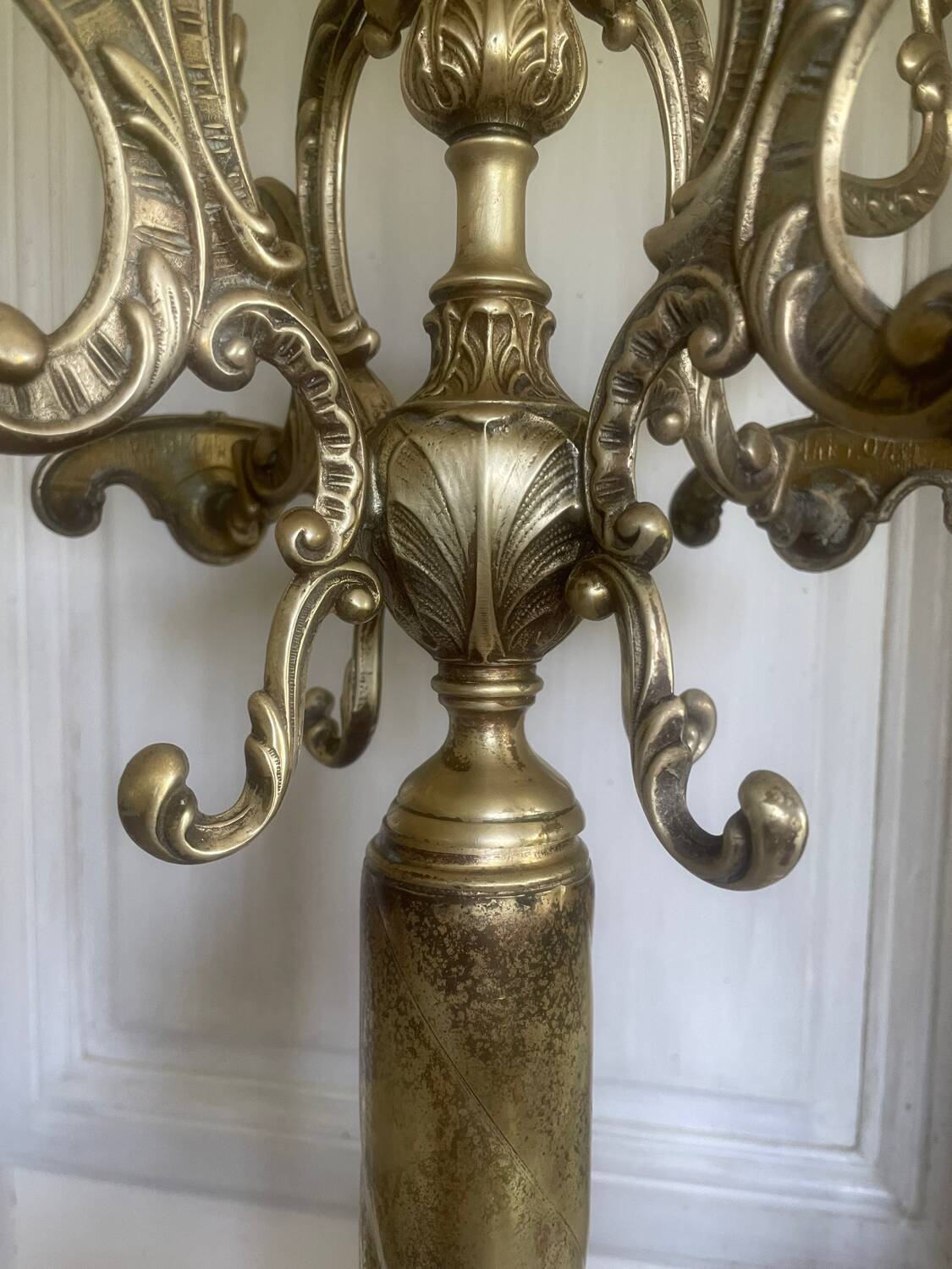 Freestanding brass coat rack