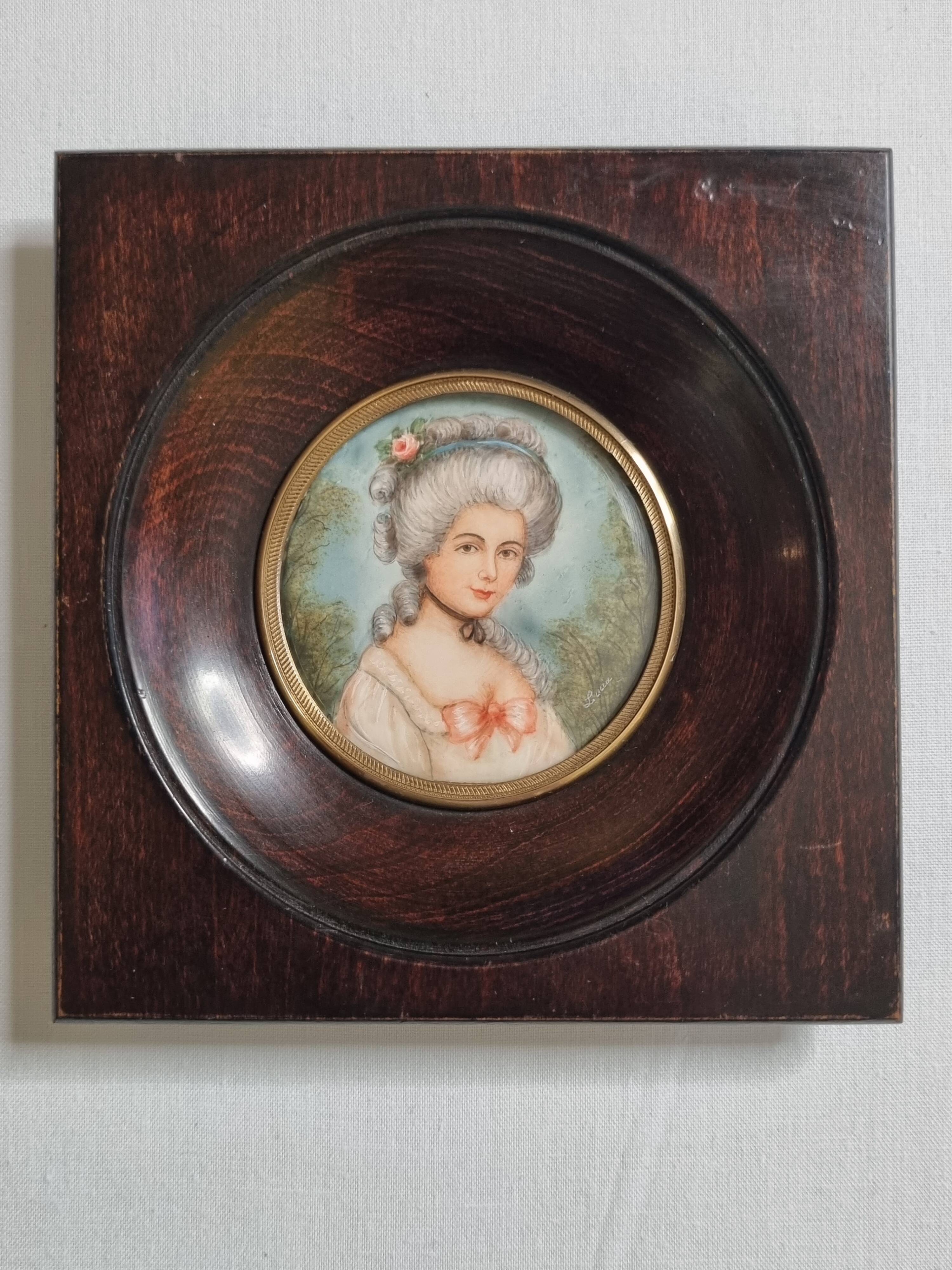 Miniature portrait of a woman in the style of Marie Antoinette, signed Lucia, 12 x 12 cm.
