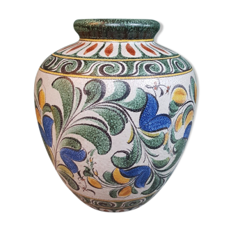 Vintage earthenware vase with a floral decor