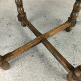 Vintage gueridon with beaded wooden legs.