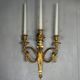 Pair of Louis XVI style wall sconces in gilded bronze, circa 1880.