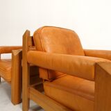 2 fauteuils en chêne et cuir cognac par Skilla