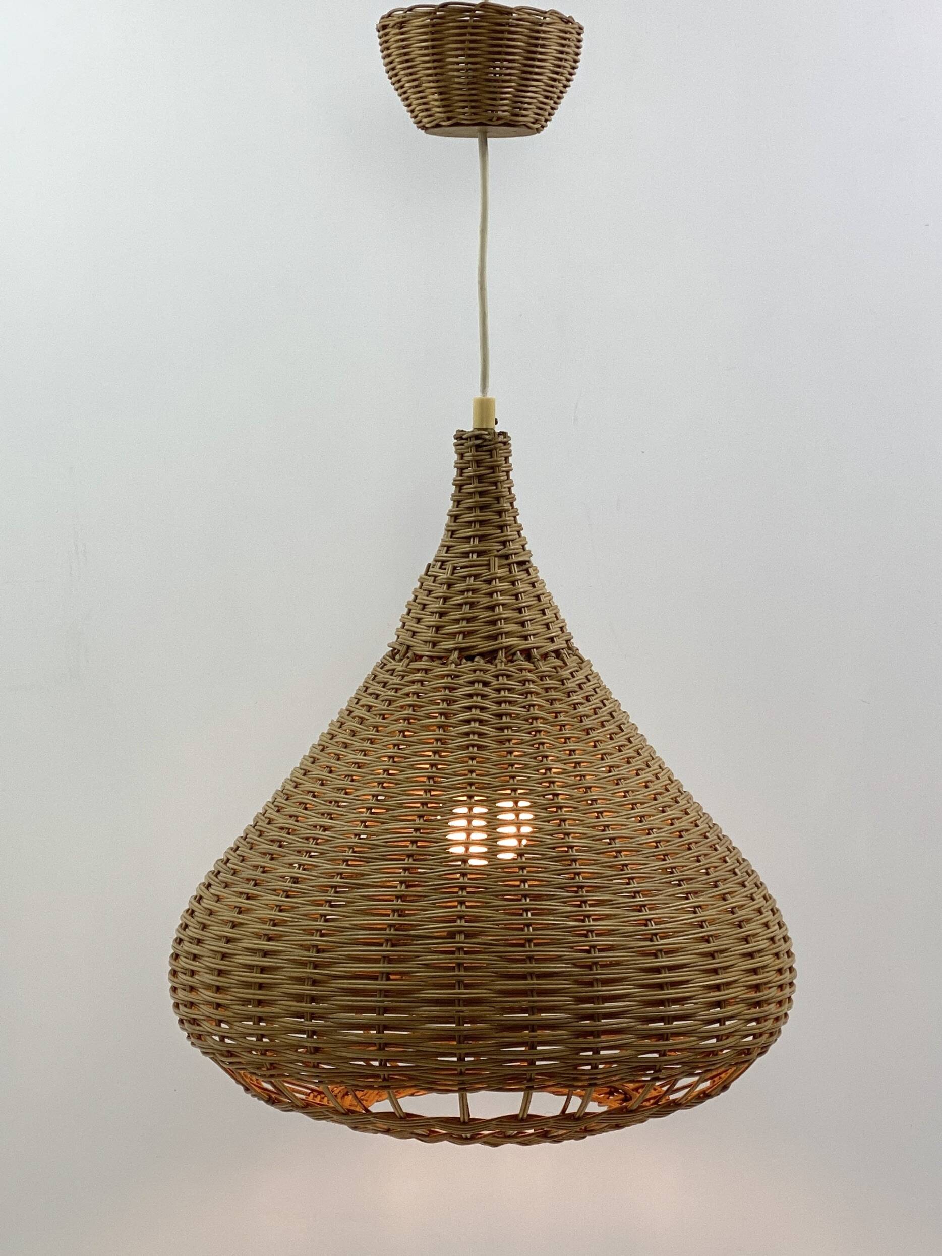 Vintage wicker pendant light from the 1960s.