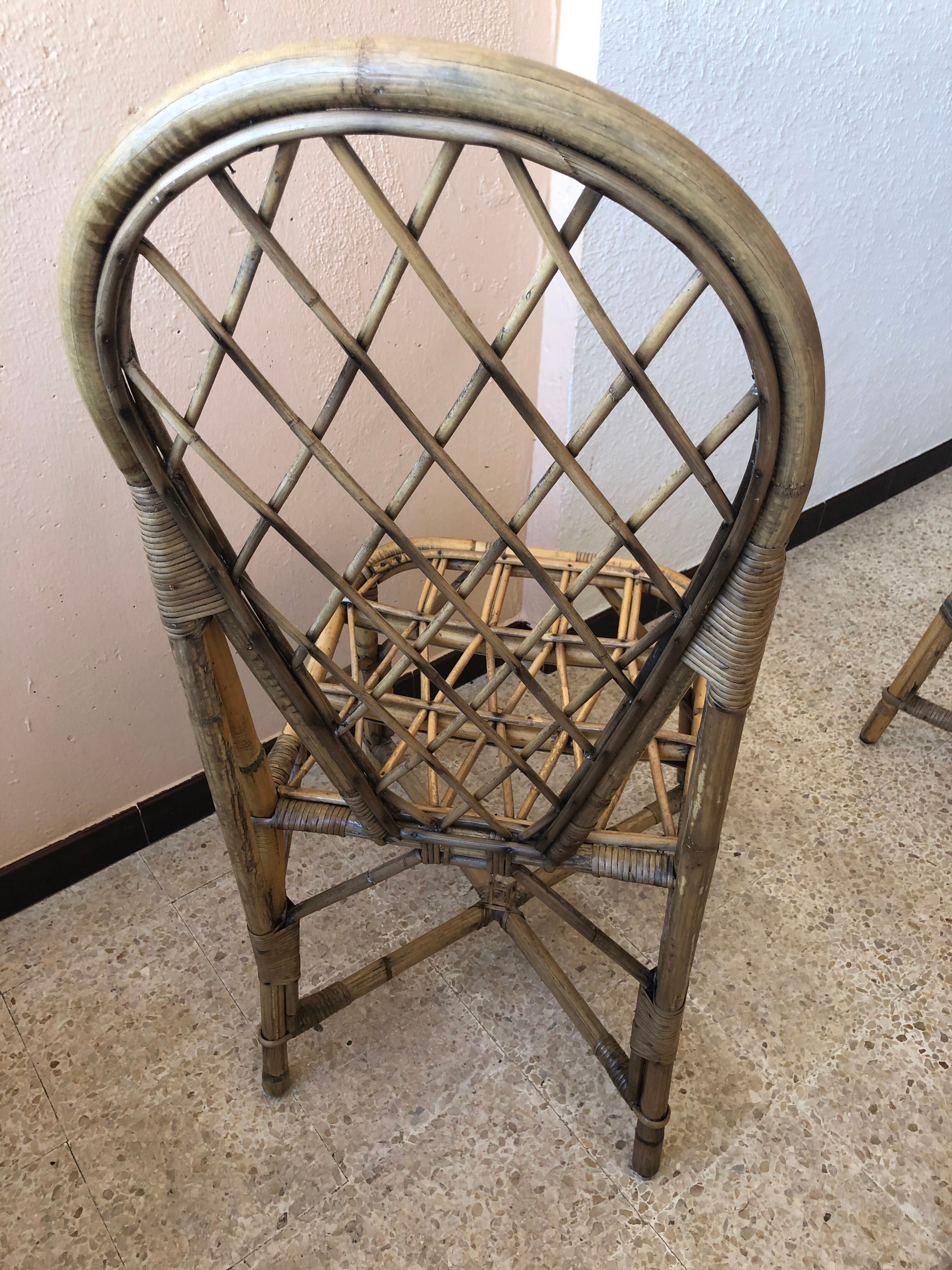 Series of 4 vintage rattan chairs