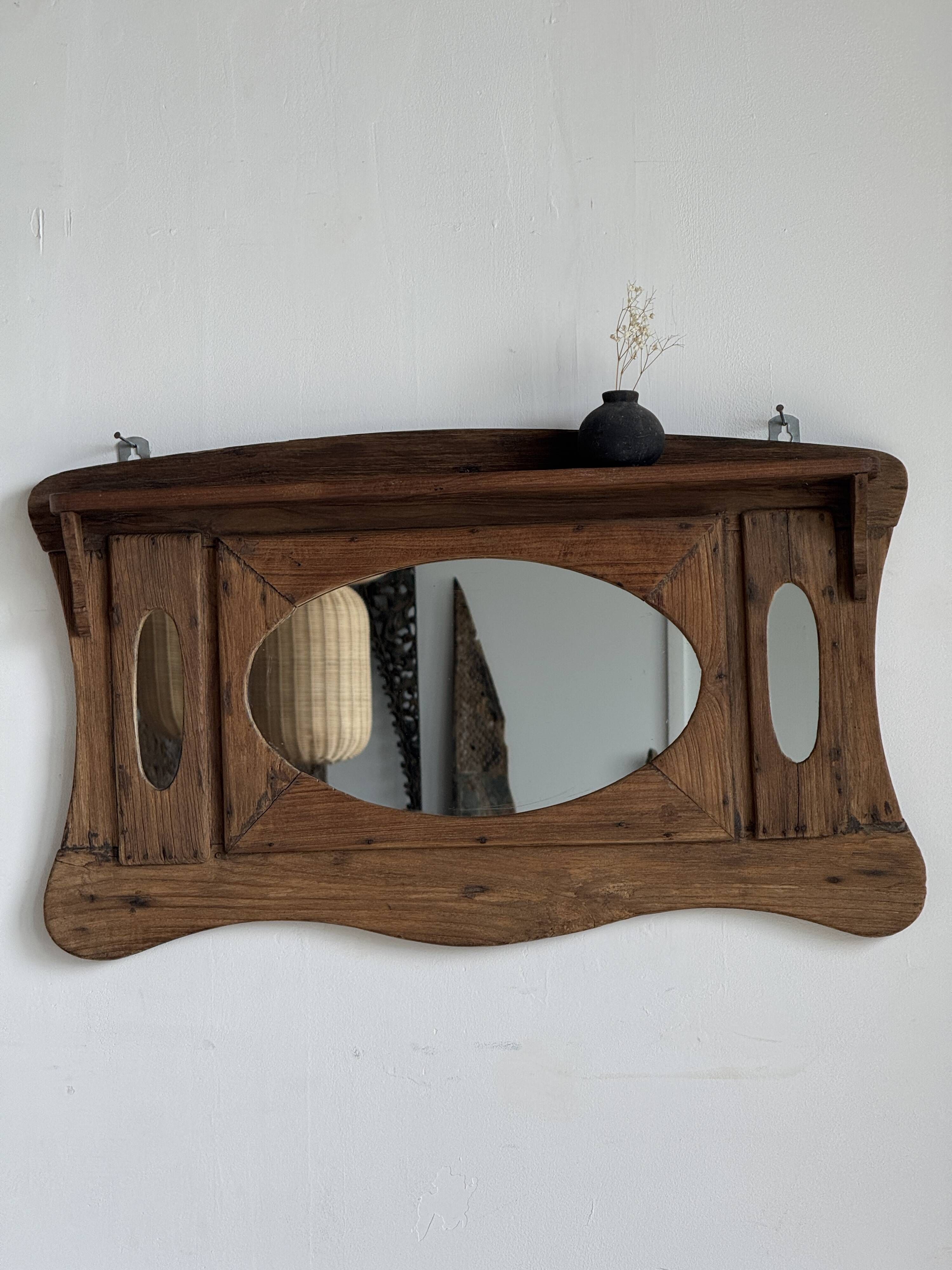 Small wall mirror in organic old Indonesian teak 75x45.