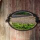 Art Deco mirror in wrought iron and beveled glass