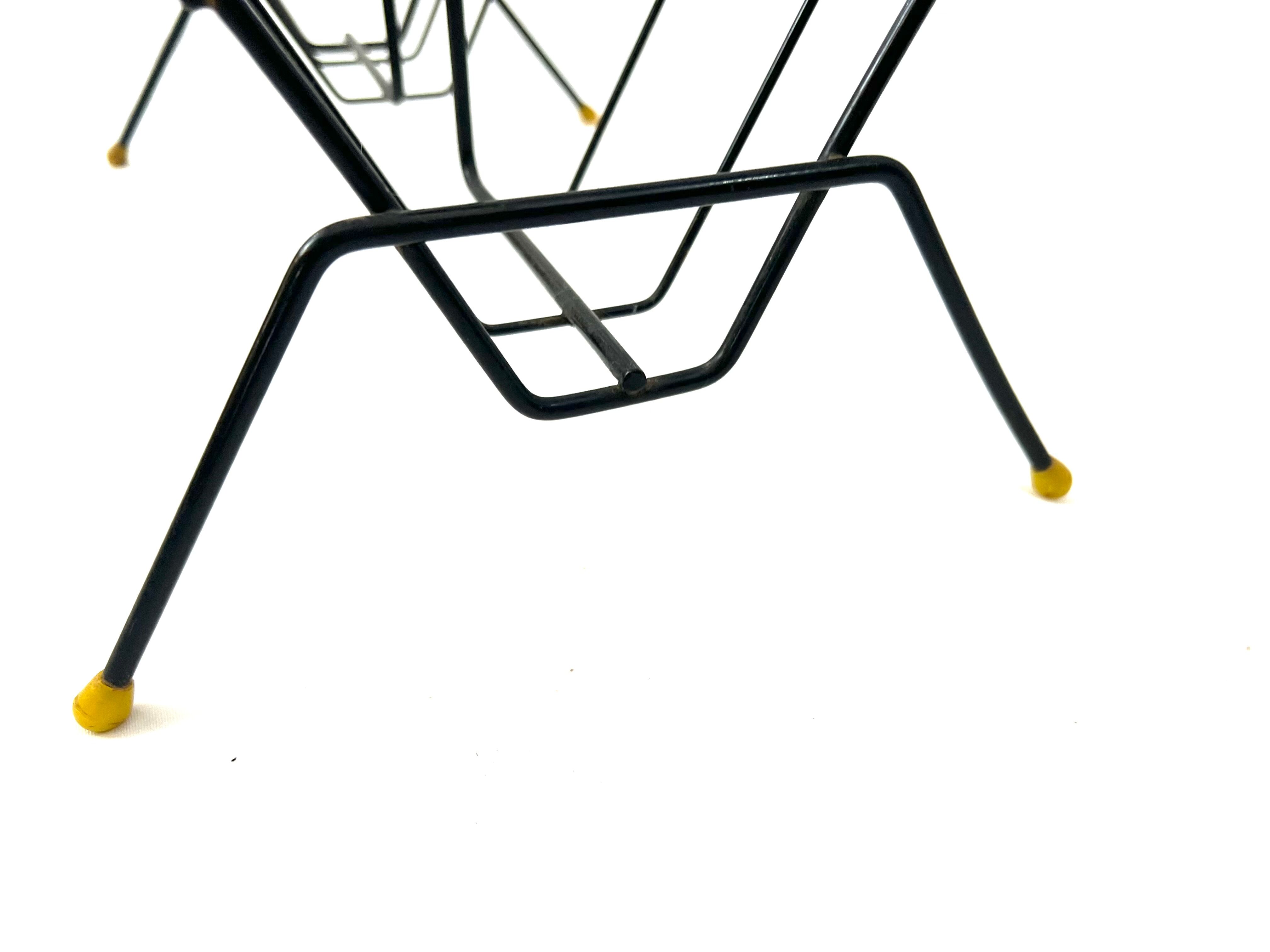 Vintage black and yellow magazine holder and vinyl record holder