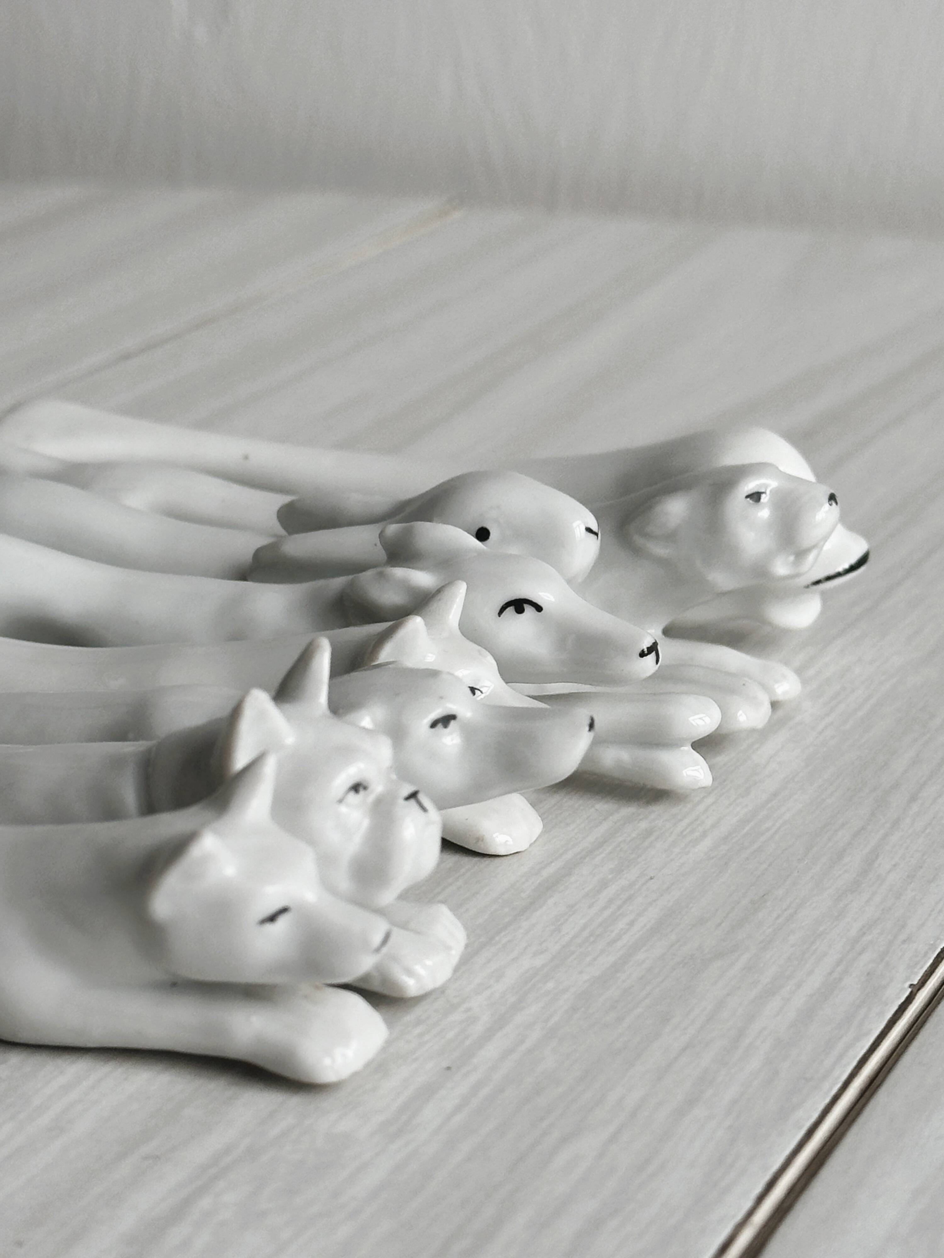 Porcelain animal knife holder.