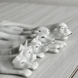 Porcelain animal knife holder.