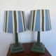 Pair of vintage wooden lamps with their striped beige, blue, and green shades.