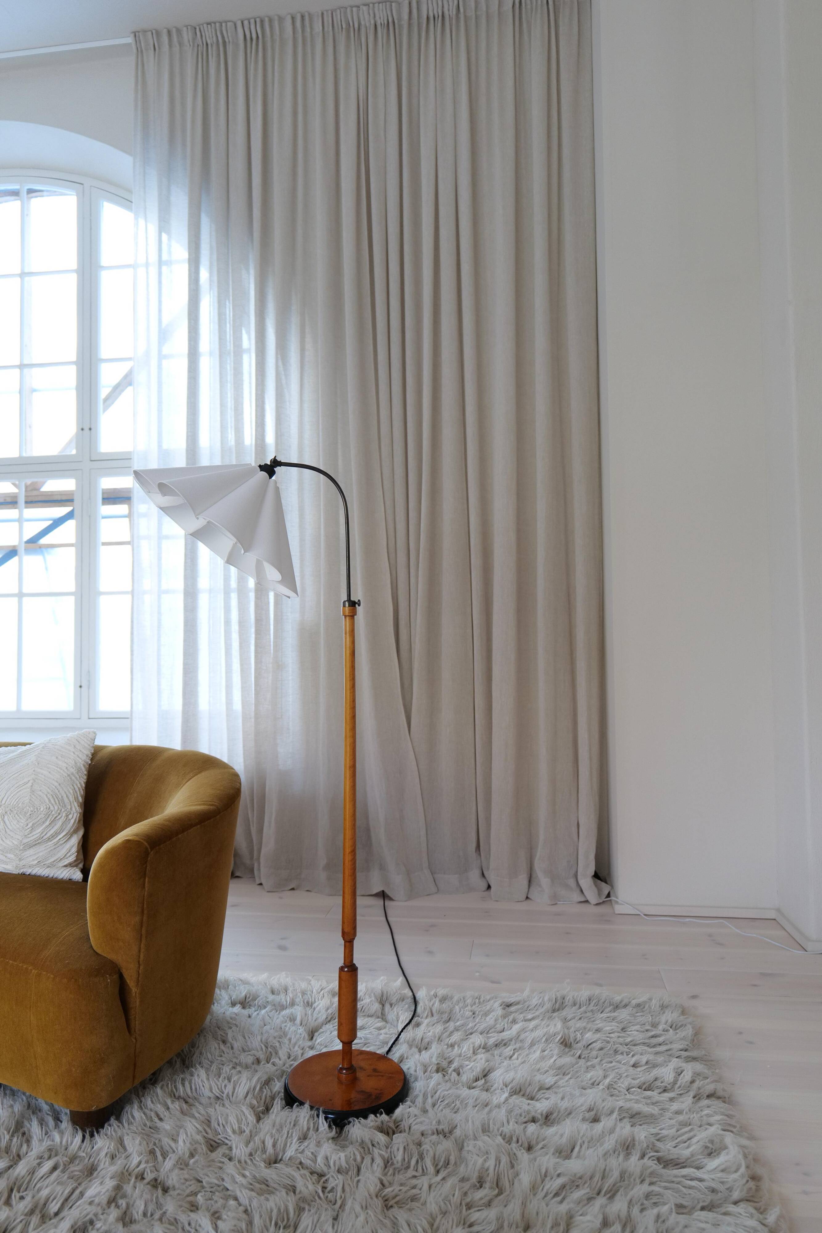 Organic Art Deco floor lamp in stained birch, Sweden, 1930s.