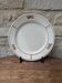 Round service plate in Iron Earth Salins model Nénuphar 29cm