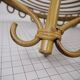 Half-moon rattan shelf and coat holder