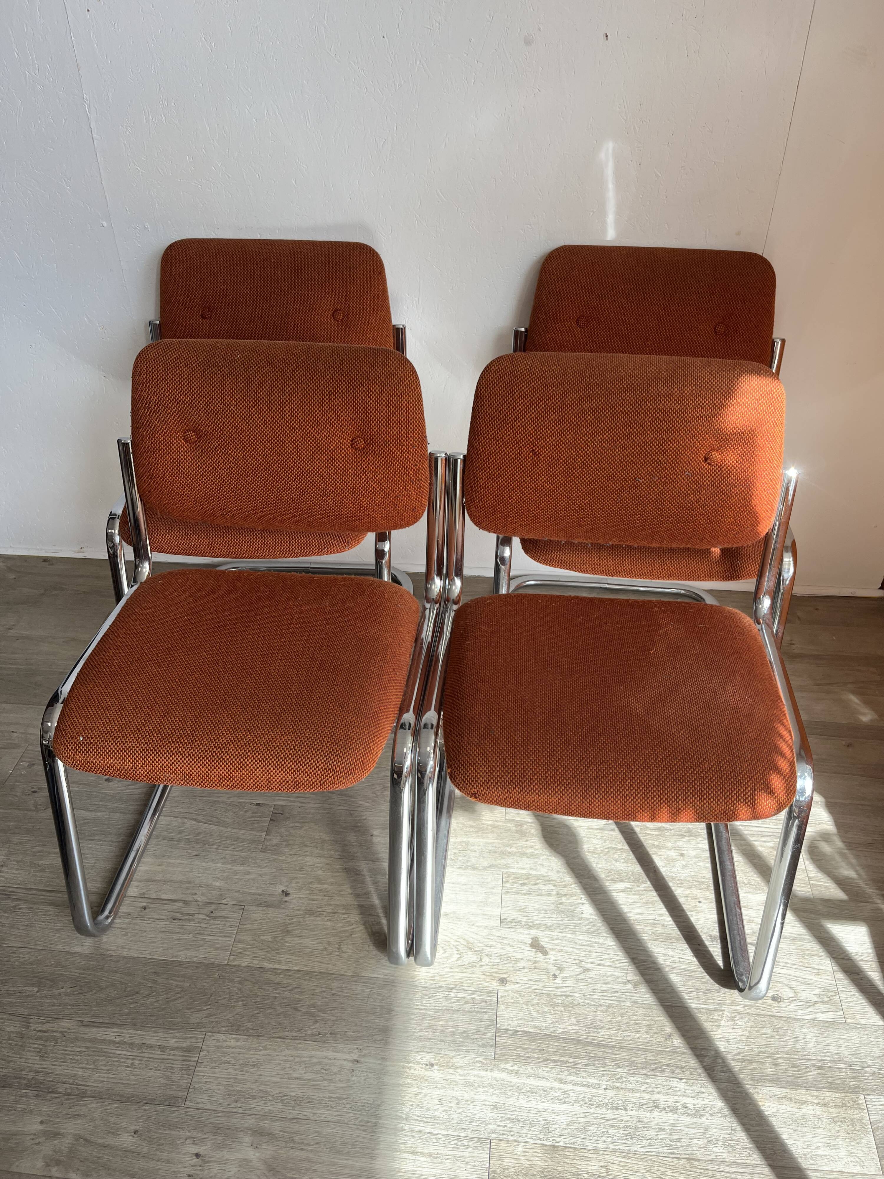 Vintage 70s orange tubular chairs